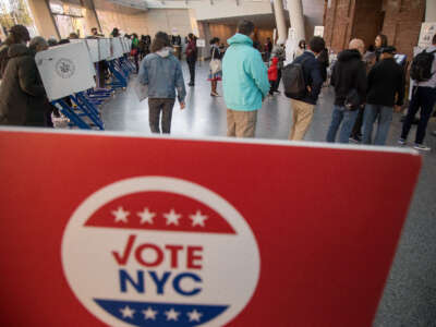 Voters are seen at a polling station in New York, on November 8, 2022.