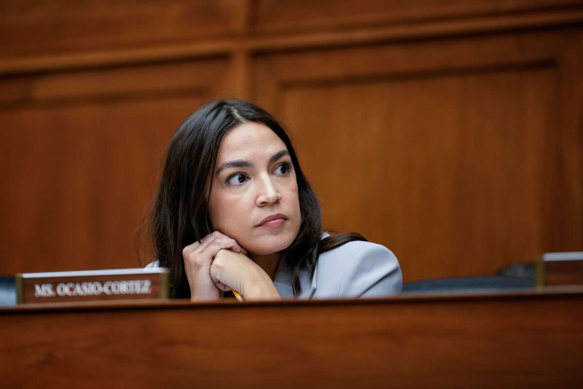 Rep. Alexandria Ocasio-Cortez attends a House Oversight Subcommittee on Health Care and Financial Services hearing on Capitol Hill on December 5, 2023, in Washington, D.C.