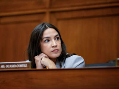 Rep. Alexandria Ocasio-Cortez attends a House Oversight Subcommittee on Health Care and Financial Services hearing on Capitol Hill on December 5, 2023, in Washington, D.C.