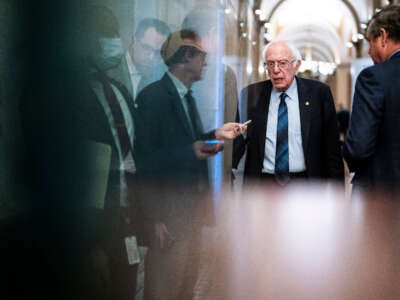 Sen. Bernie Sanders talks to reporters on Capitol Hill on November 14, 2023, in Washington, D.C.