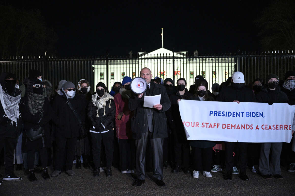 Former State Department official and activist Josh Paul, who resigned over Israel's ongoing bombardment of Gaza, speaks during a demonstration calling for a ceasefire, in front of the White House in Washington, D.C., on December 13, 2023.