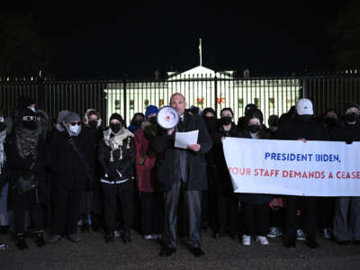 Former State Department official and activist Josh Paul, who resigned over Israel's ongoing bombardment of Gaza, speaks during a demonstration calling for a ceasefire, in front of the White House in Washington, D.C., on December 13, 2023.