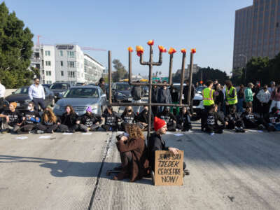 American Jews and allies block the 110 freeway in downtown on Wednesday, December 13, 2023, in Los Angeles, California, to call for a ceasefire in Gaza.
