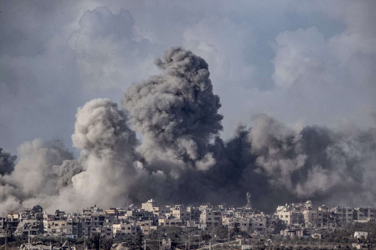 Smoke rising from the Shuja'iyya district of Gaza after Israeli attacks is seen from Nahal Oz, Israel, on December 9, 2023.