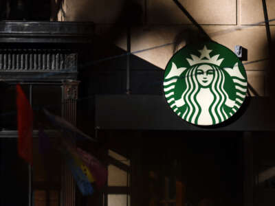 A Starbucks logo is seen outside of a Starbucks store in Dupont Circle on November 16, 2023, in Washington, D.C.