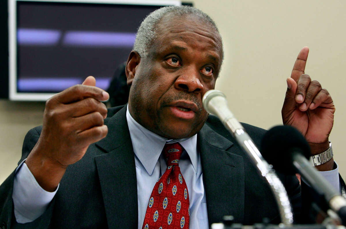 Supreme Court Justice Clarence Thomas testifies before the House Financial Services and General Government Subcommittee on Capitol Hill on March 8, 2007, in Washington, D.C.