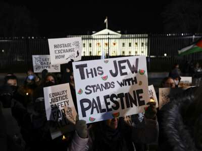 Jewish groups gather outside the White House on the fifth night of Hanukkah, the Jewish festival of lights, to protest Israel's attacks on Gaza, in Washington, D.C. on December 11, 2023.