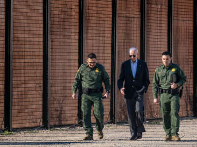 President Joe Biden speaks with U.S. Customs and Border Protection officers as he visits the U.S.-Mexico border in El Paso, Texas, on January 8, 2023.