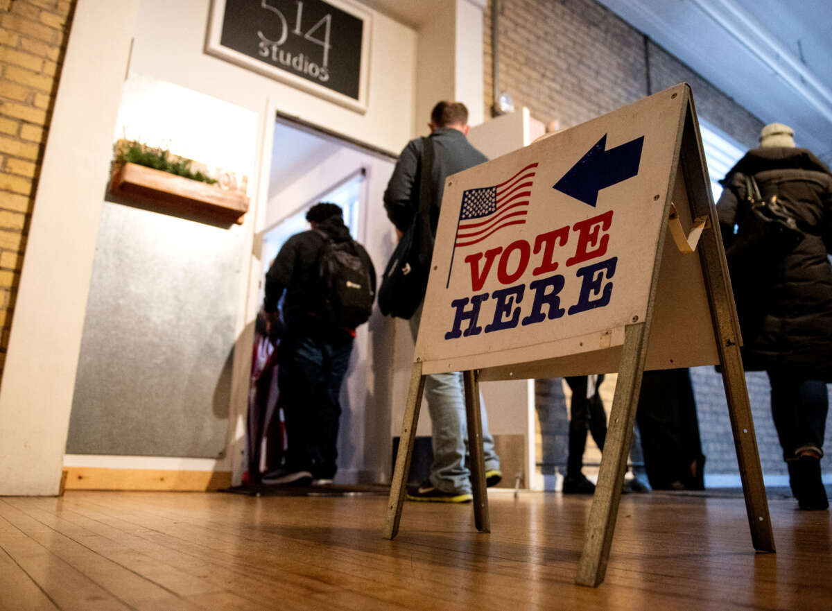 A sign guides voters on Election Day at 514 Studios on November 6, 2018, in Minneapolis, Minnesota.