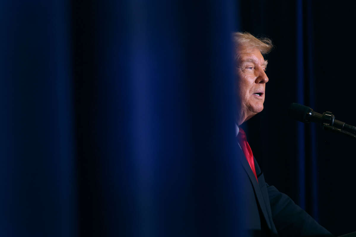 Former President Donald Trump speaks at a campaign event at the Hyatt Hotel on December 13, 2023, in Coralville, Iowa.