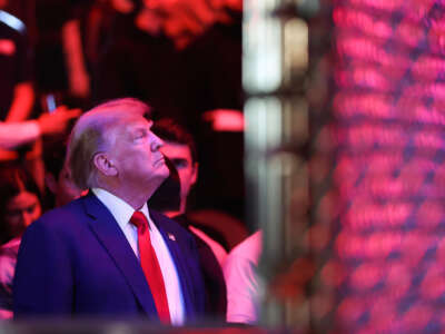 Former President Donald Trump looks on as he attends a UFC event at T-Mobile Arena on December 16, 2023, in Las Vegas, Nevada.