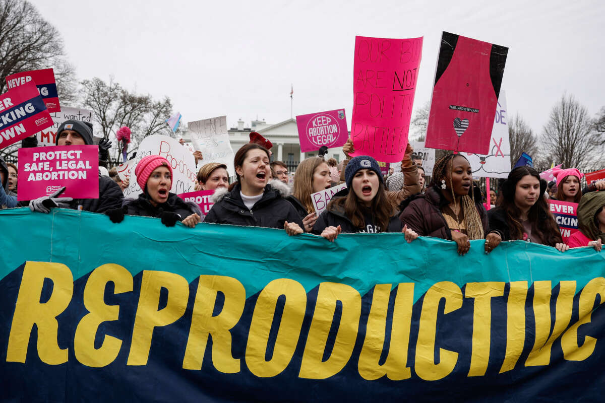 People protest in front of the White House during the annual National Women's March on January 22, 2023, in Washington, D.C.