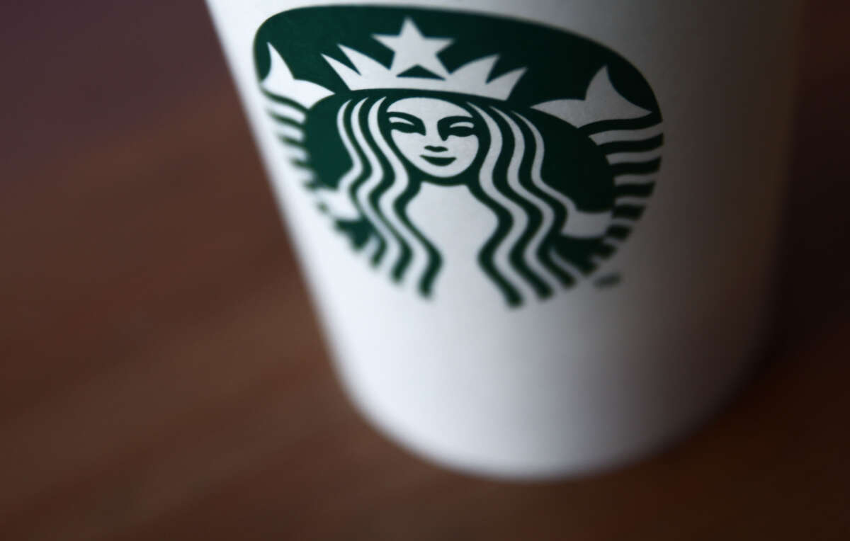 The Starbucks Coffee logo is seen on a cup in a photo taken on October 10, 2023.