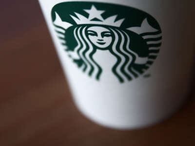 The Starbucks Coffee logo is seen on a cup in a photo taken on October 10, 2023.