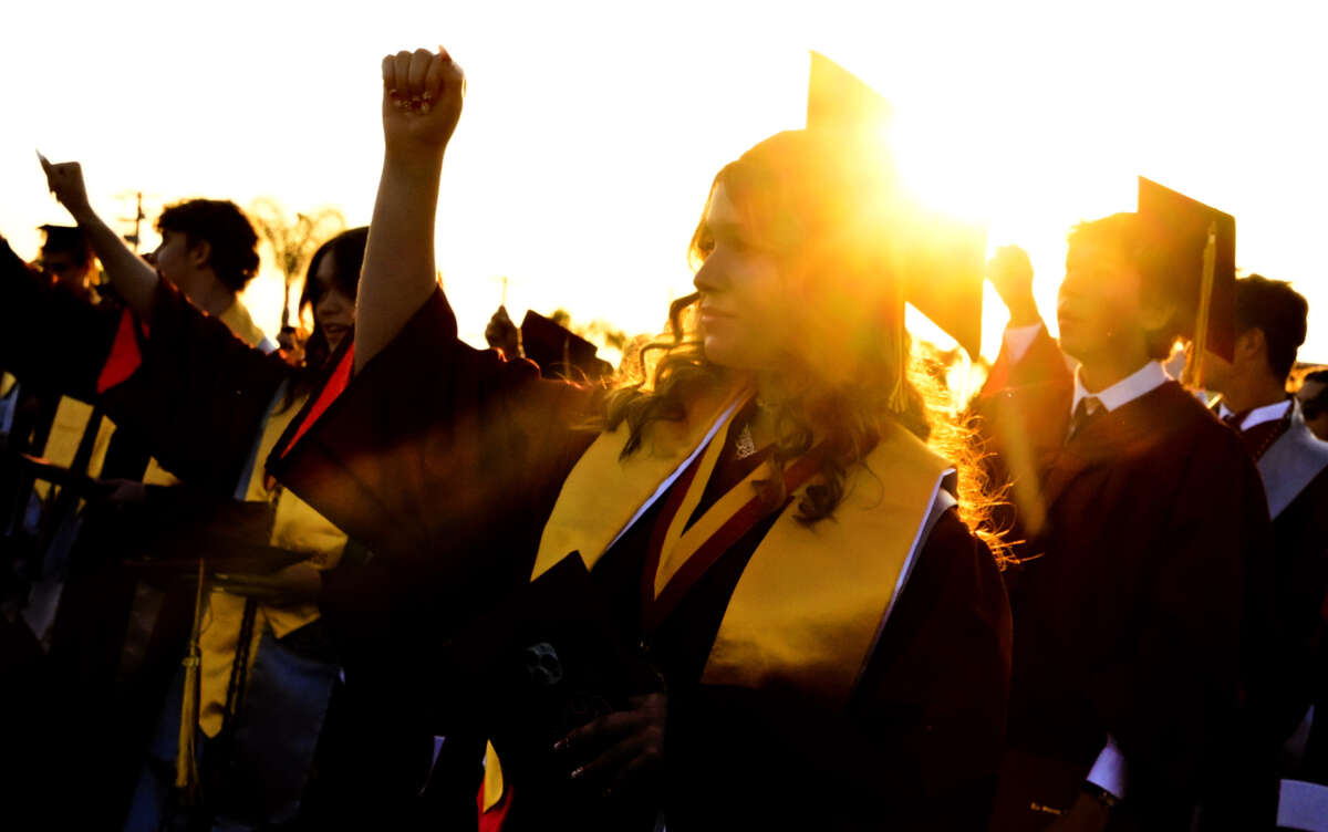 A graduate celebrates after receiving their diploma during the La Serna graduation at La Serna High School in Whittier, California, on June 7, 2023.