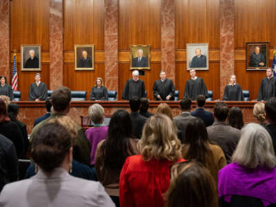 Members of the Texas Supreme Court arrive to hear litigators make their arguments in Zurowski v. State of Texas, at the Texas Supreme Court in Austin, Texas, on November 28, 2023.
