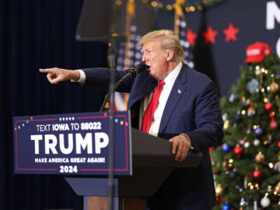 Republican presidential candidate and former U.S. President Donald Trump speaks at a campaign event on December 19, 2023, in Waterloo, Iowa.