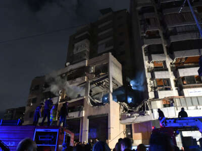 Smoke rises after Israeli drone struck a Hamas office in Dahieh region of Beirut, Lebanon, on January 2, 2024.