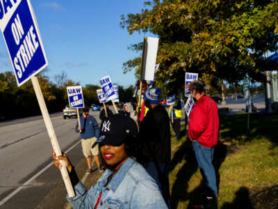 United Auto Worker members stand in a picket line outside of the Ford Motor Co. Kentucky Truck Plant in the morning hours on October 14, 2023, in Louisville, Kentucky.