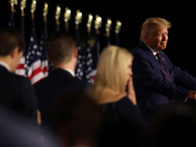 Then-President Donald Trump delivers his acceptance speech for the Republican presidential nomination as son-in-law and senior advisor Jared Kushner and children Eric and Ivanka Trump look on on the South Lawn of the White House August 27, 2020, in Washington, D.C.