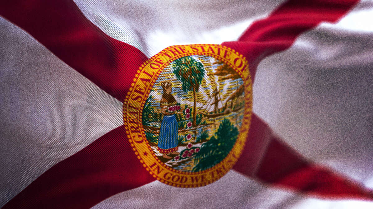 Close-up view of the Florida state flag waving in the wind.