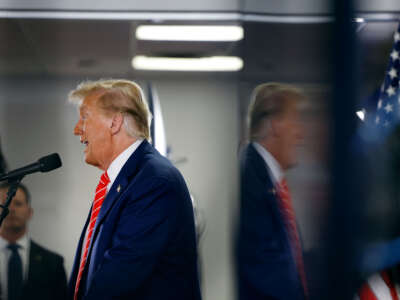 Former President Donald Trump speaks at a campaign event on January 6, 2024, in Newton, Iowa.