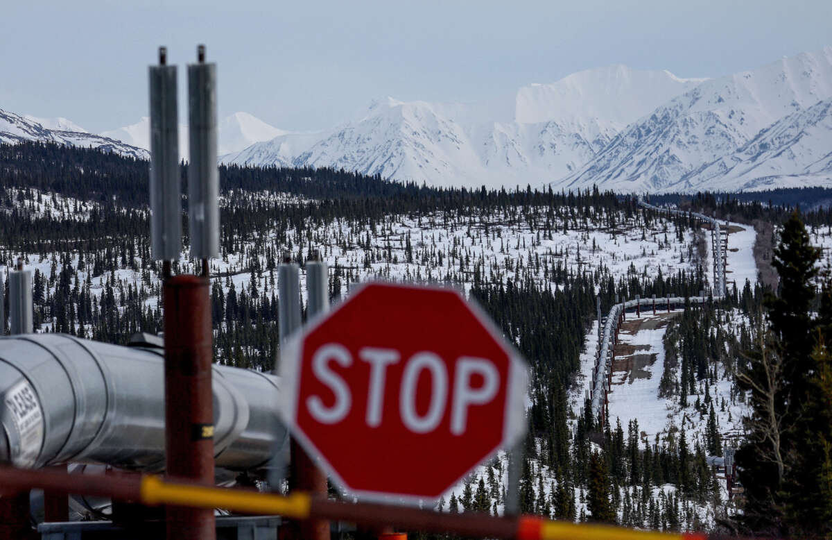 A part of the Trans Alaska Pipeline System runs through boreal forest past Alaska Range mountains on May 5, 2023, near Delta Junction, Alaska.