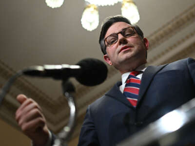 House Speaker Mike Johnson speaks to the press on Capitol Hill in Washington, D.C., on December 12, 2023.