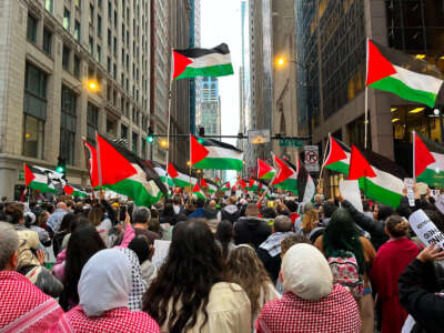 People participate in a march in support of Palestine in Chicago, Illinois, on October 18, 2023.