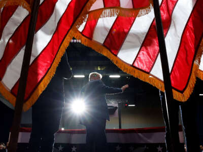 Former President Donald Trump speaks during his caucus night event at the Iowa Events Center on January 15, 2024, in Des Moines, Iowa.