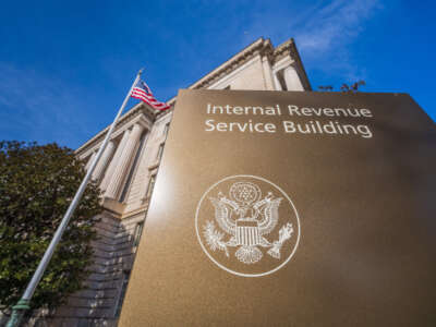 The U.S. flag flies above the International Revenue Service headquarters building on January 3, 2024, in Washington, D.C.