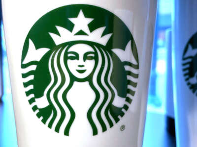 The Starbucks emblem is seen on a reusable coffee cup in Annapolis, Maryland, on February 2, 2023.