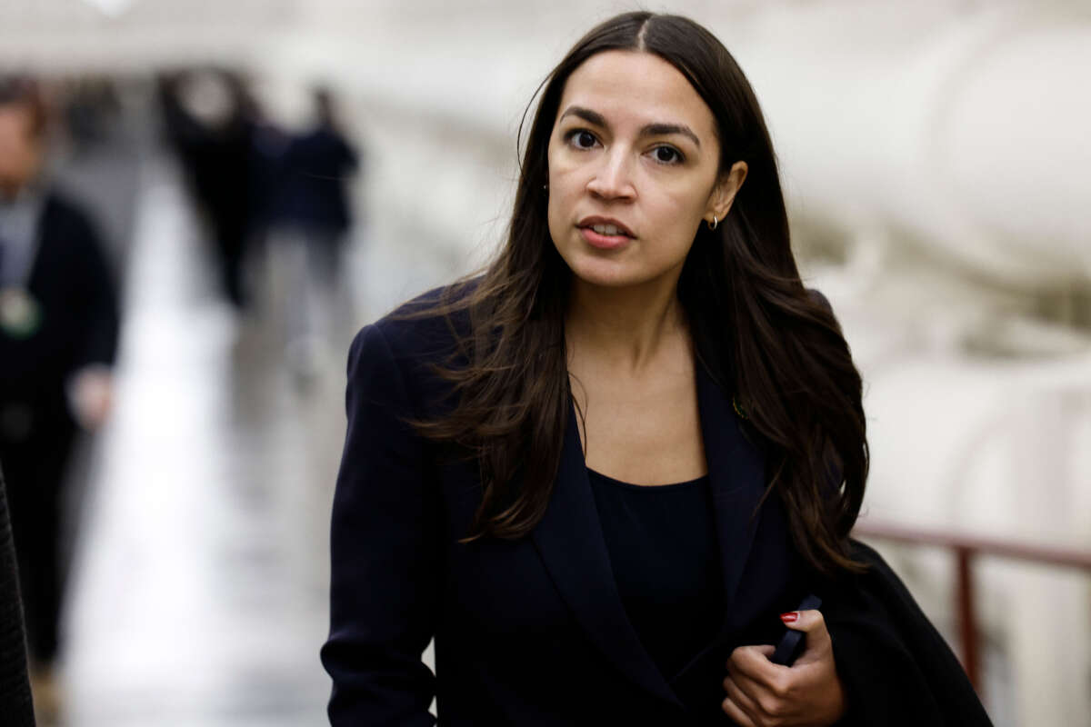 Rep. Alexandria Ocasio-Cortez walks to the House Chambers of the U.S. Capitol Building on November 14, 2023, in Washington, D.C.