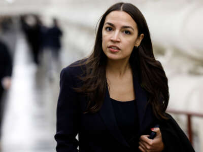 Rep. Alexandria Ocasio-Cortez walks to the House Chambers of the U.S. Capitol Building on November 14, 2023, in Washington, D.C.