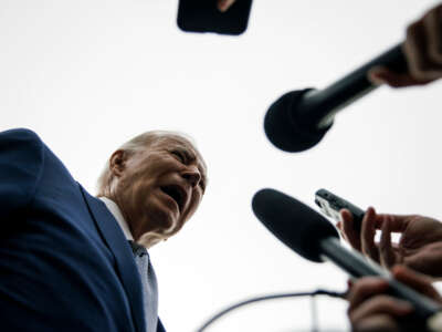 President Joe Biden takes some questions from members of the press before departing in Marine One from the South Lawn of the White House on January 18, 2024, in Washington, D.C.