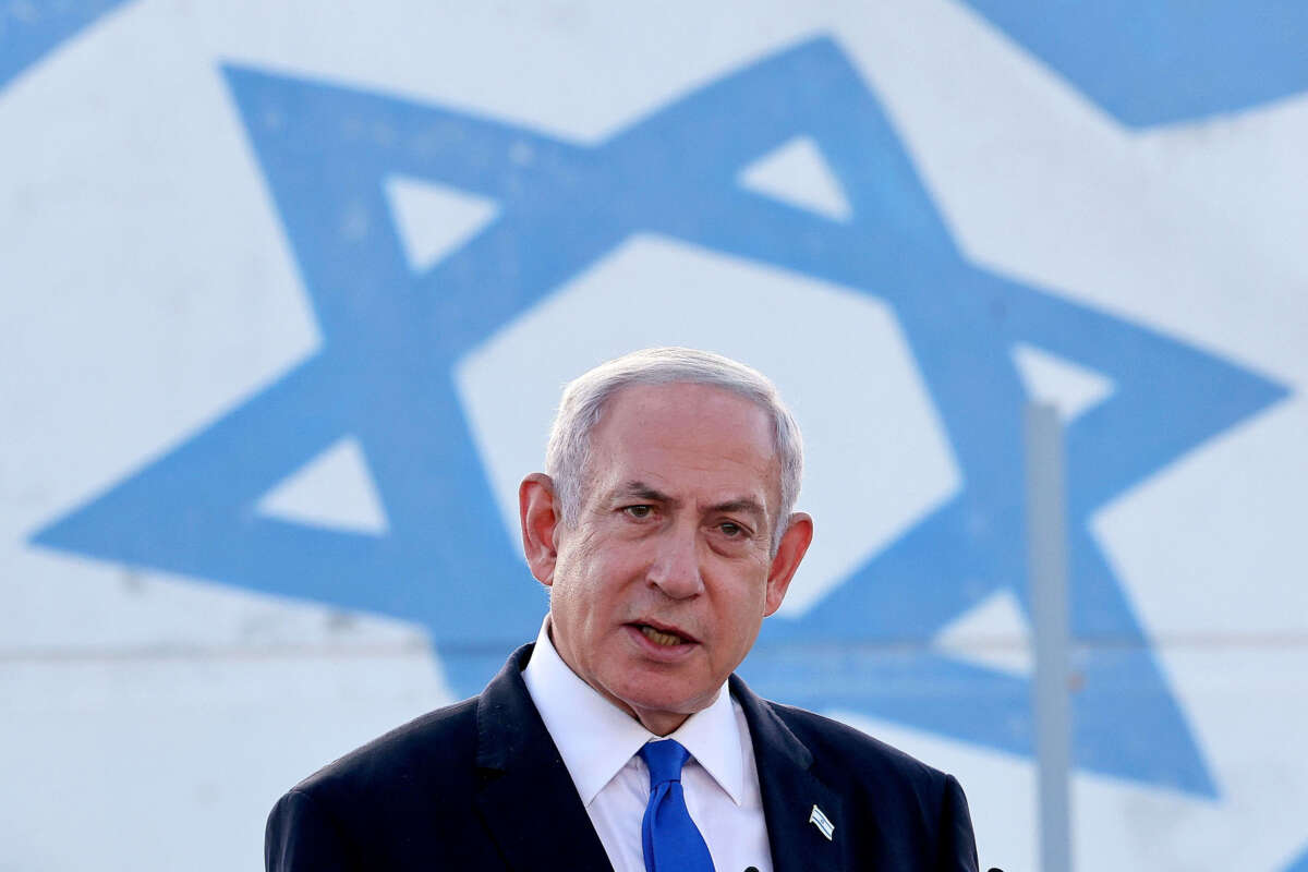 Israel's Prime Minister Benjamin Netanyahu delivers a speech during his visit to an Israeli unmanned aerial vehicle center, at the Palmachim Airbase near the city of Rishon LeZion on July 5, 2023.