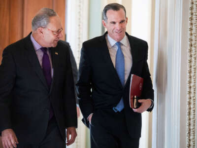 Brett McGurk, former special envoy to counter ISIS, right, and then-Senate Minority Leader Charles Schumer make their way to the Democratic luncheon in the Capitol on October 23, 2019, in Washington, D.C.
