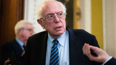 Sen. Bernie Sanders talks with reporters after the senate luncheons in the U.S. Capitol on November 28, 2023.