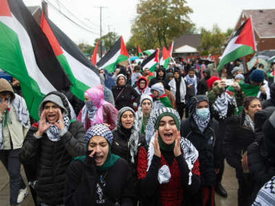 Residents of Detroit and Dearborn march in support of Palestine on October 14, 2023, in Dearborn, Michigan.