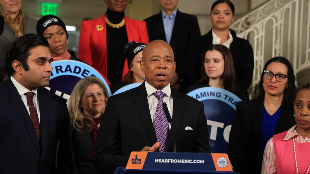 New York City Mayor Eric Adams, flanked by Health Commissioner Dr. Ashwin Vasan (L), Deputy Mayor for Health and Human Services Anne Williams-Isom (R), and HTC union members announces a medical debt relief program that will invest $18 million over three years to relieve over $2 billion in medical debt for hundreds of thousands of working-class New Yorkers during a press conference on January 22, 2024, in New York City.