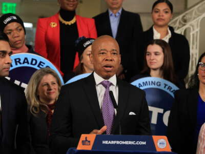 New York City Mayor Eric Adams, flanked by Health Commissioner Dr. Ashwin Vasan (L), Deputy Mayor for Health and Human Services Anne Williams-Isom (R), and HTC union members announces a medical debt relief program that will invest $18 million over three years to relieve over $2 billion in medical debt for hundreds of thousands of working-class New Yorkers during a press conference on January 22, 2024, in New York City.