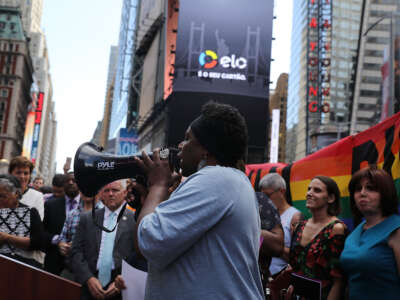 Transgender Army veteran Tanya Walker speaks to protesters in Times Square near a military recruitment center during a rally against President Donald Trump's decision to reinstate a ban on transgender individuals from serving in the military on July 26, 2017, in New York City.