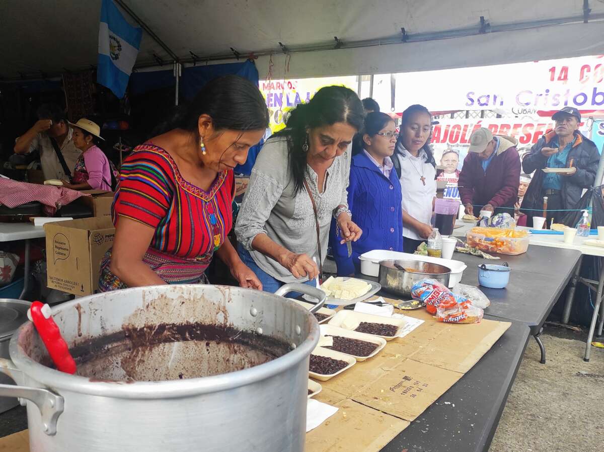Volunteers run a kitchen to feed protesters at the encampment outside the public prosecutors’ office in Guatemala City.