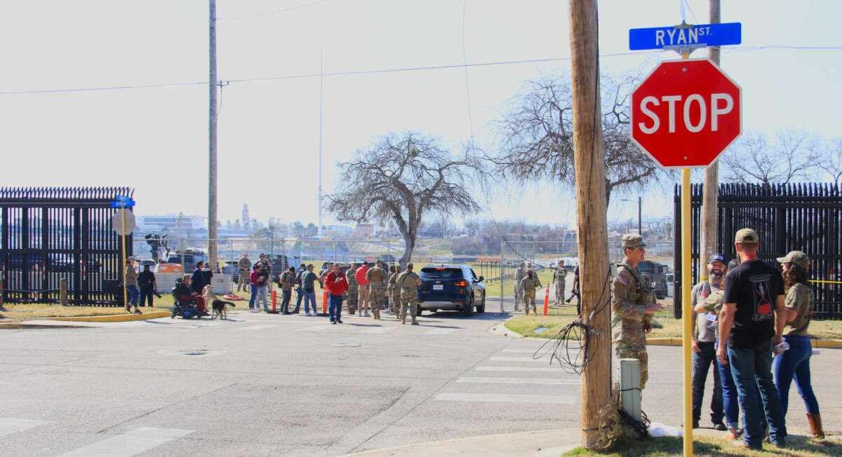 Texas National Guard and supporters of former President Donald Trump and Texas Gov. Greg Abbott are visible outside Shelby Park on February 4, 2024, in Eagle Pass, Texas.