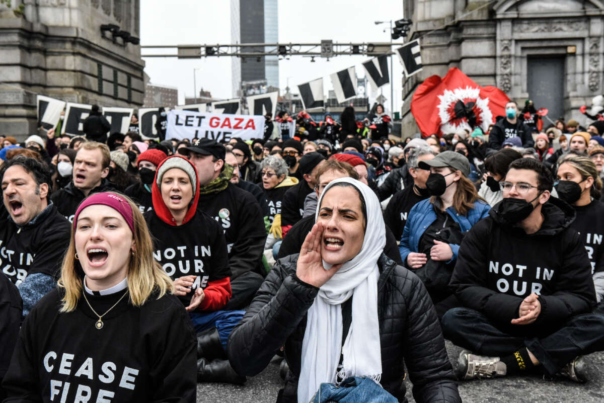 Activists from the group Jewish Voice for Peace stage a sit-in blockade of the Manhattan Bridge on November 26, 2023, in New York City.