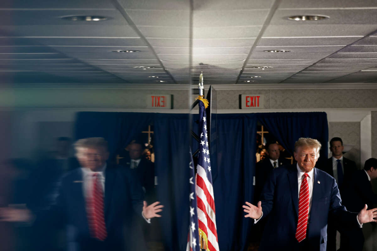 Former President Donald Trump arrives for a campaign rally in the basement ballroom of The Margate Resort on January 22, 2024, in Laconia, New Hampshire.