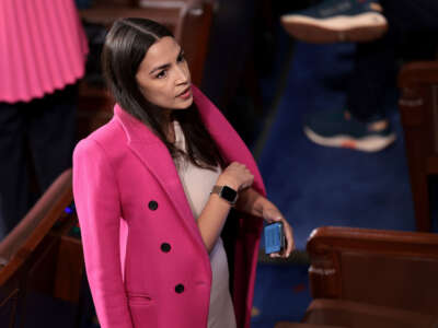 Rep. Alexandria Ocasio-Cortez arrives as the House of Representatives holds an election for a new Speaker of the House at the U.S. Capitol on October 25, 2023, in Washington, D.C.