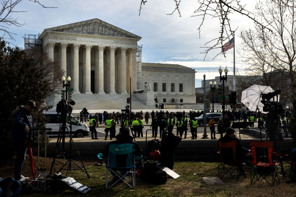 The U.S. Supreme Court with media, police and spectators outside, on February 8, 2024, in Washington, D.C.