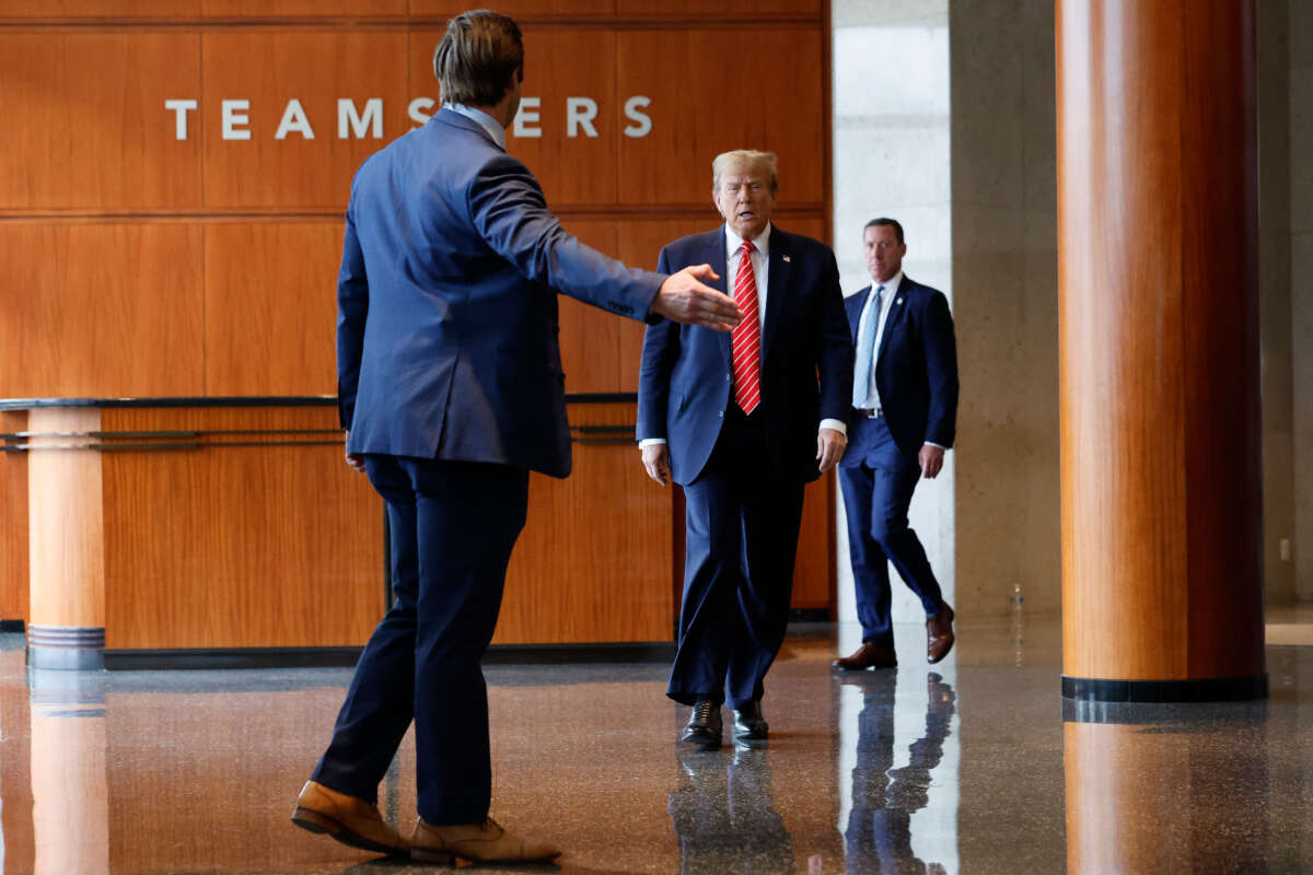 Former President Donald Trump walks to a podium to deliver remarks after meeting with leaders of the International Brotherhood of Teamsters at their headquarters on January 31, 2024, in Washington, D.C.