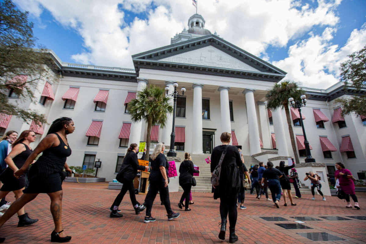 Advocates for bodily autonomy march to the Florida Capitol to protest a bill before the Florida legislature to limit abortions on February 16, 2022, in Tallahassee, Florida.